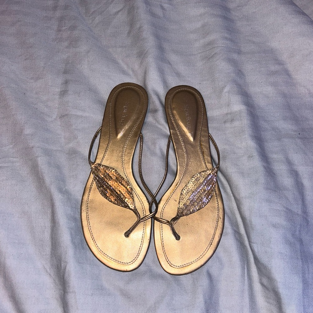 Gold flip flops